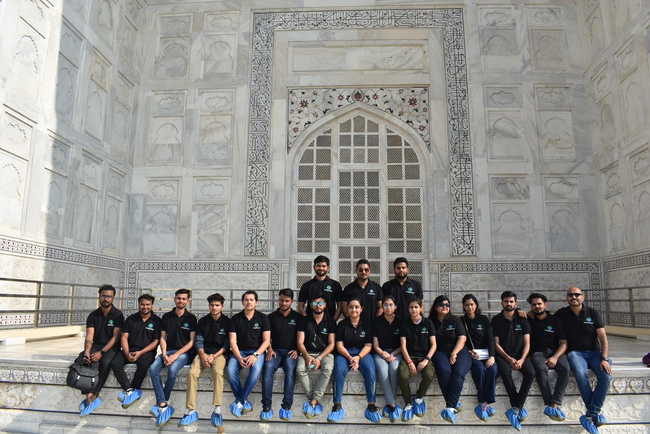 Proeffico team celebrating annual milestone at Noida HQ